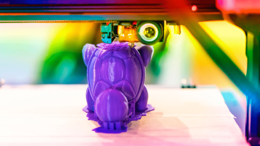 a 3d printer is being used to make a toy