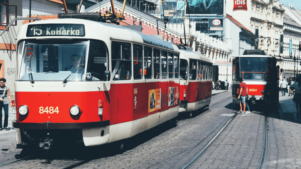 traffic on a busy city street with buses and cars